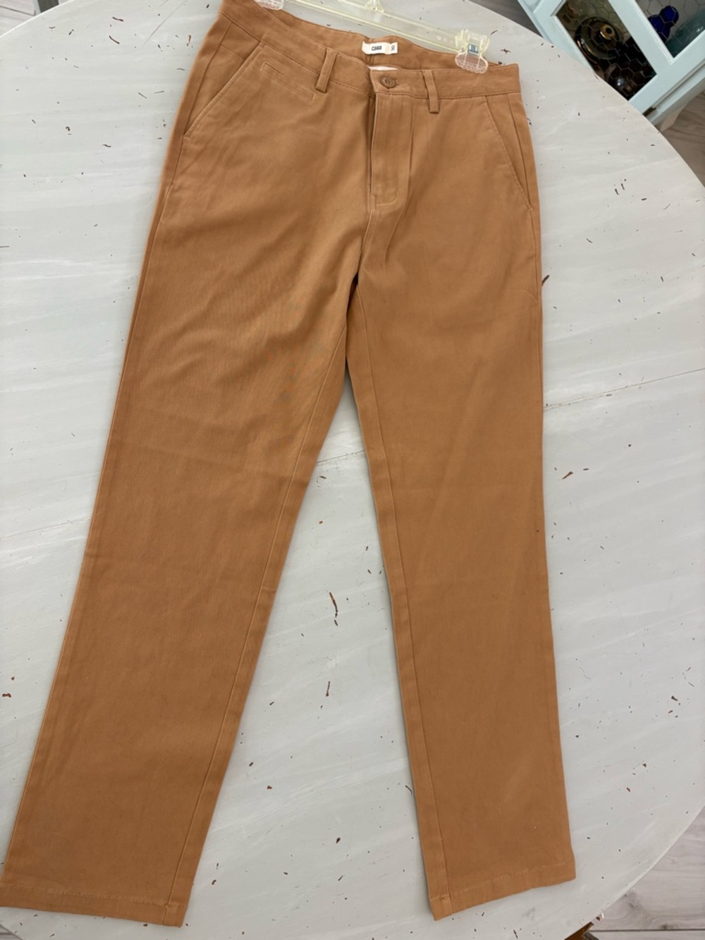 Women’s CASS Tan Chino Pants retail for $200